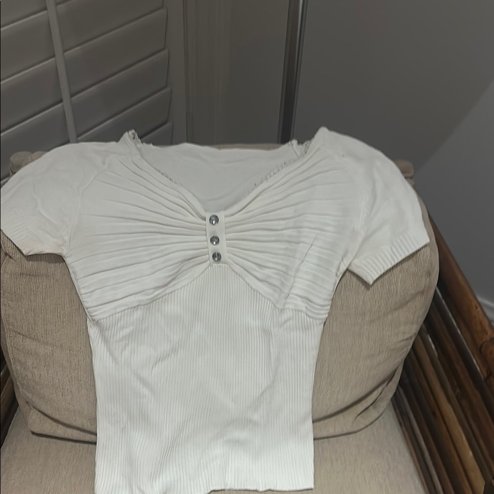 Cute top with crystals.